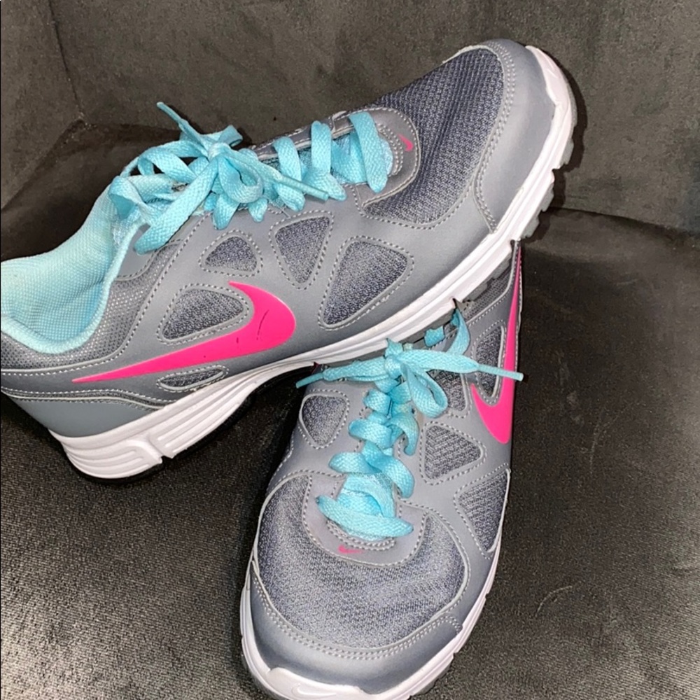 Nike Women’s Gray Athletic Shoes with Pink Swoosh and Light Blue Accents